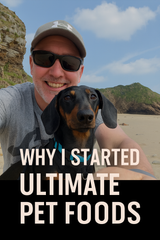 Founder of Ultimate Pet Foods smiling with his black and tan Dachshund on a sunny beach, wearing sunglasses and a cap, with bold white text overlay reading ‘Why I Started Ultimate Pet Foods.